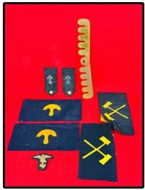 Old Navy Insignia & Infantry Pioneer Arm Bands: Early US Navy insignia which includes a embroidered eagle cap badge and two shoulder boards along with two pair of felt arm bands, one with a crossed axes which I believe was for the Infantry Pioneers