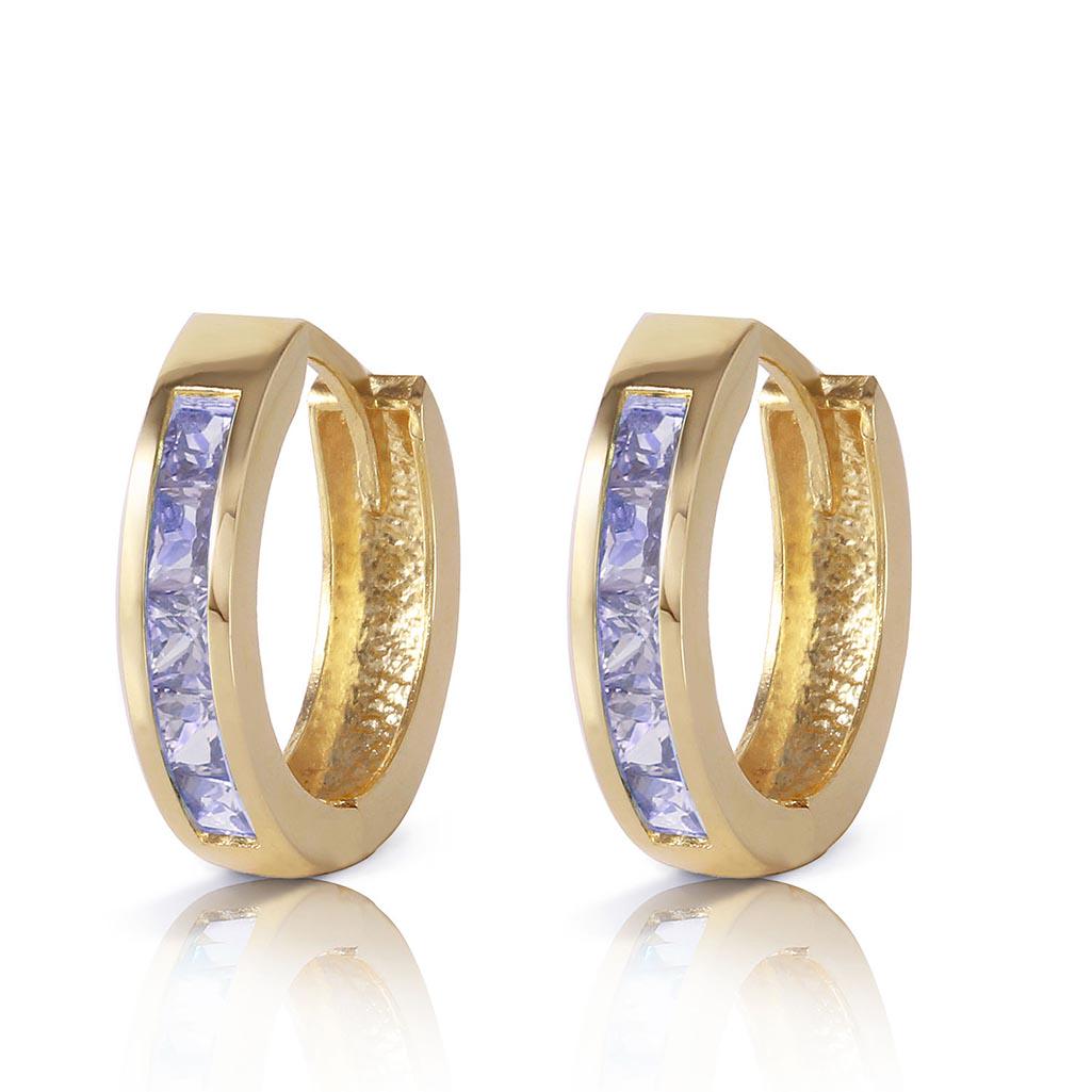 0.95 CTW 14K Solid Gold Huggie Hoop Earrings Tanzanite: 0.95 CTW 14K Solid Gold Huggie Hoop Earrings Tanzanite -- Tanzanite; Metal Color:Yellow Gold; Condition: New With Tags; TWC: 0.95 ;Metal: 14 K. Solid Yellow Gold ;Stone: Natural; Width: 0.12in (3.0mm)