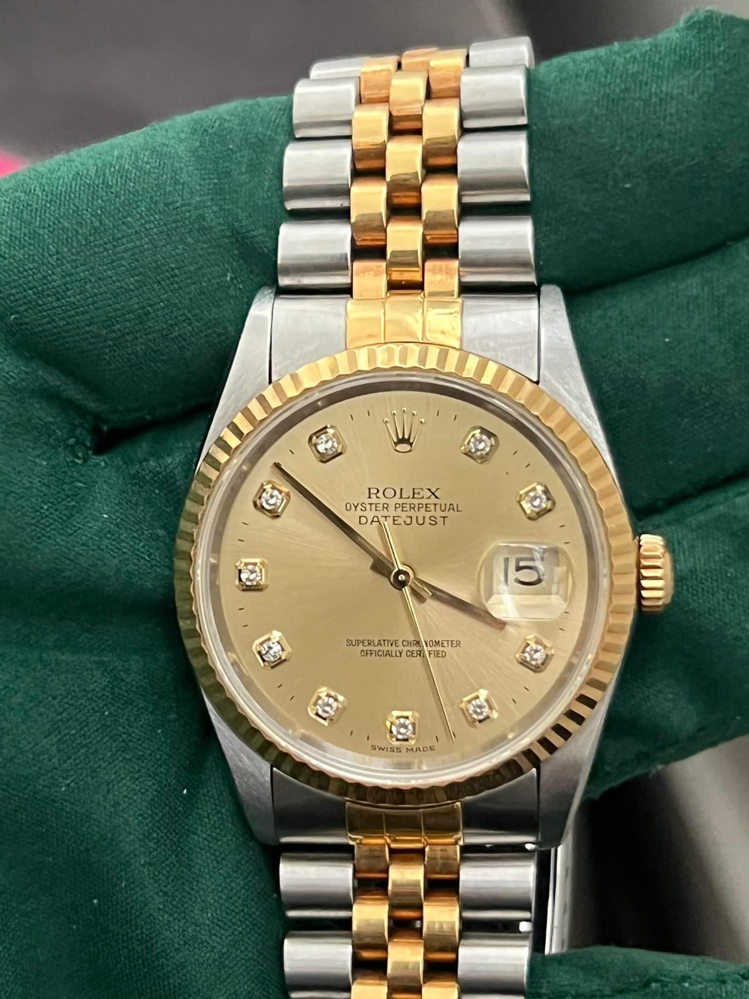 Used Rolex 36mm Oysterperpetual Datejust w/factory diam: Used Rolex 36mm Oysterperpetual Datejust w/factory diamonds. This comes with box no papers. Item does come with appraisal guaranteeing authenticity. -- Used Rolex 36mm Oysterperpetual Datejust w/facto