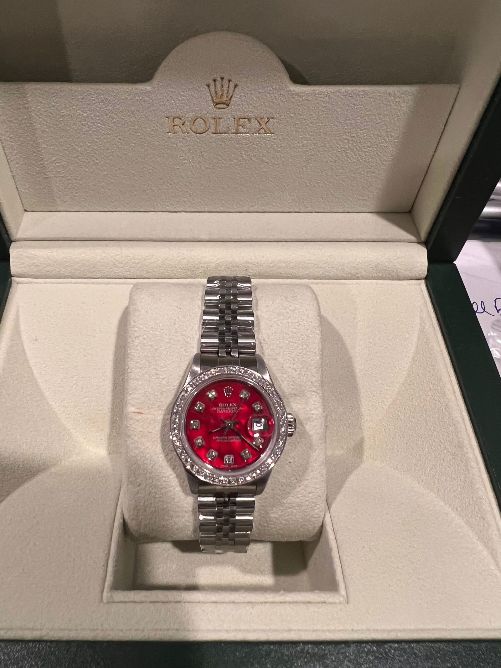 Custom 26mm Red Mother of Pearl Dial Rolex Datejust w/D: Custom 26mm Red Mother of Pearl Dial Rolex Datejust w/Diamond Bezel (G-H, SI1-SI2) comes with Box & Papers -- Custom 26mm Red Mother of Pearl Dial Rolex Datejust w/Diamond Bezel (G-H, SI1-SI2) comes w