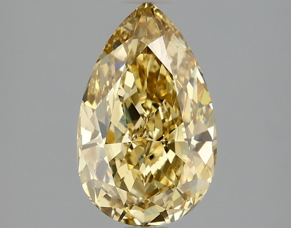 2.1 ctw. VS1 IGI Certified Pear Cut Loose Diamond (LAB GROWN): 2.1 ctw. VS1 IGI Certified Pear Cut Loose Diamond (LAB GROWN) -- IGI Certified Pear Cut Loose Diamond (LAB GROWN) - Weight :- 2.1 ctw; Color :- Fancy Vivid Yellow; Clarity :-VS1 #TSD68426v14