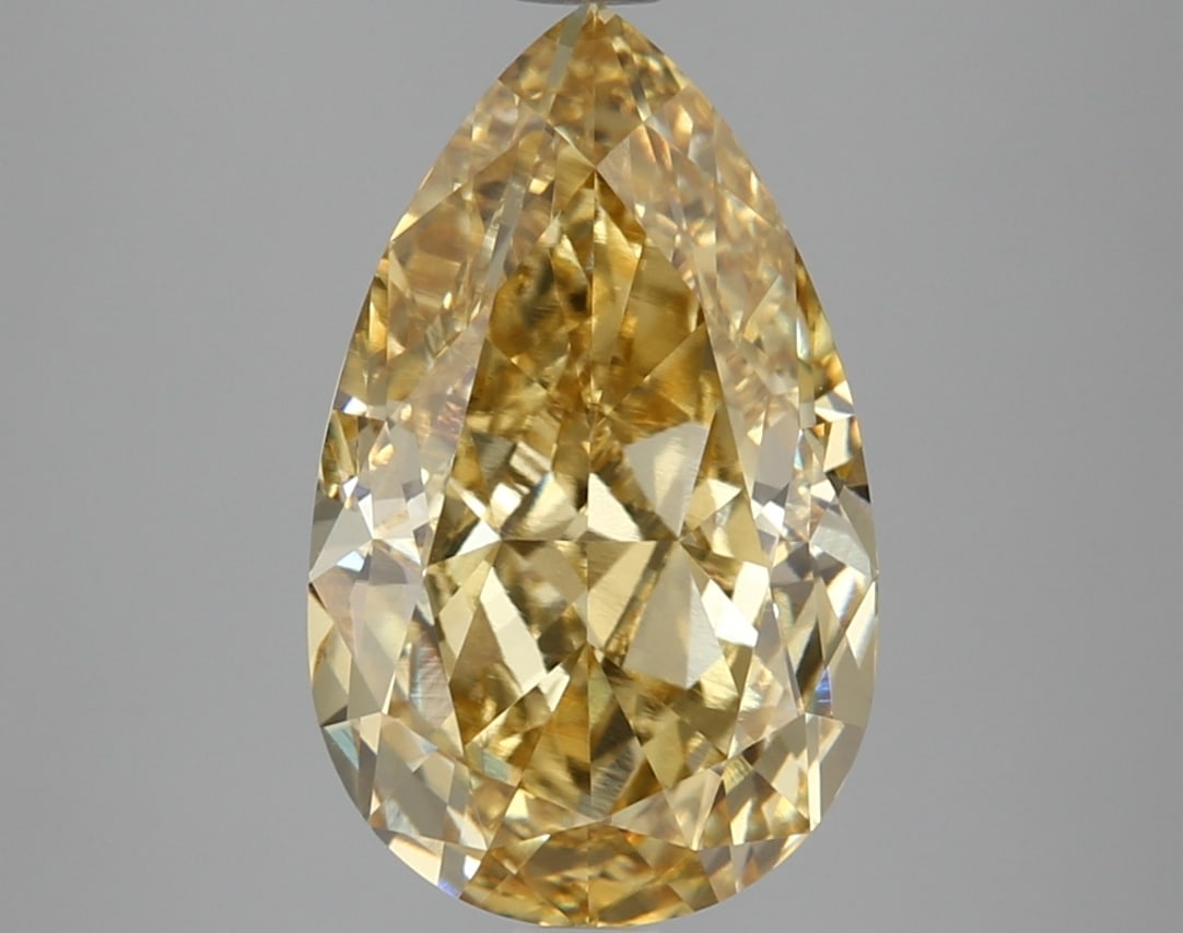 5.14 ctw. VVS2 IGI Certified Pear Cut Loose Diamond (LAB GROWN): 5.14 ctw. VVS2 IGI Certified Pear Cut Loose Diamond (LAB GROWN) -- IGI Certified Pear Cut Loose Diamond (LAB GROWN) - Weight :- 5.14 ctw; Color :- Fancy Vivid Yellow; Clarity :-VVS2 #TSD67947v14