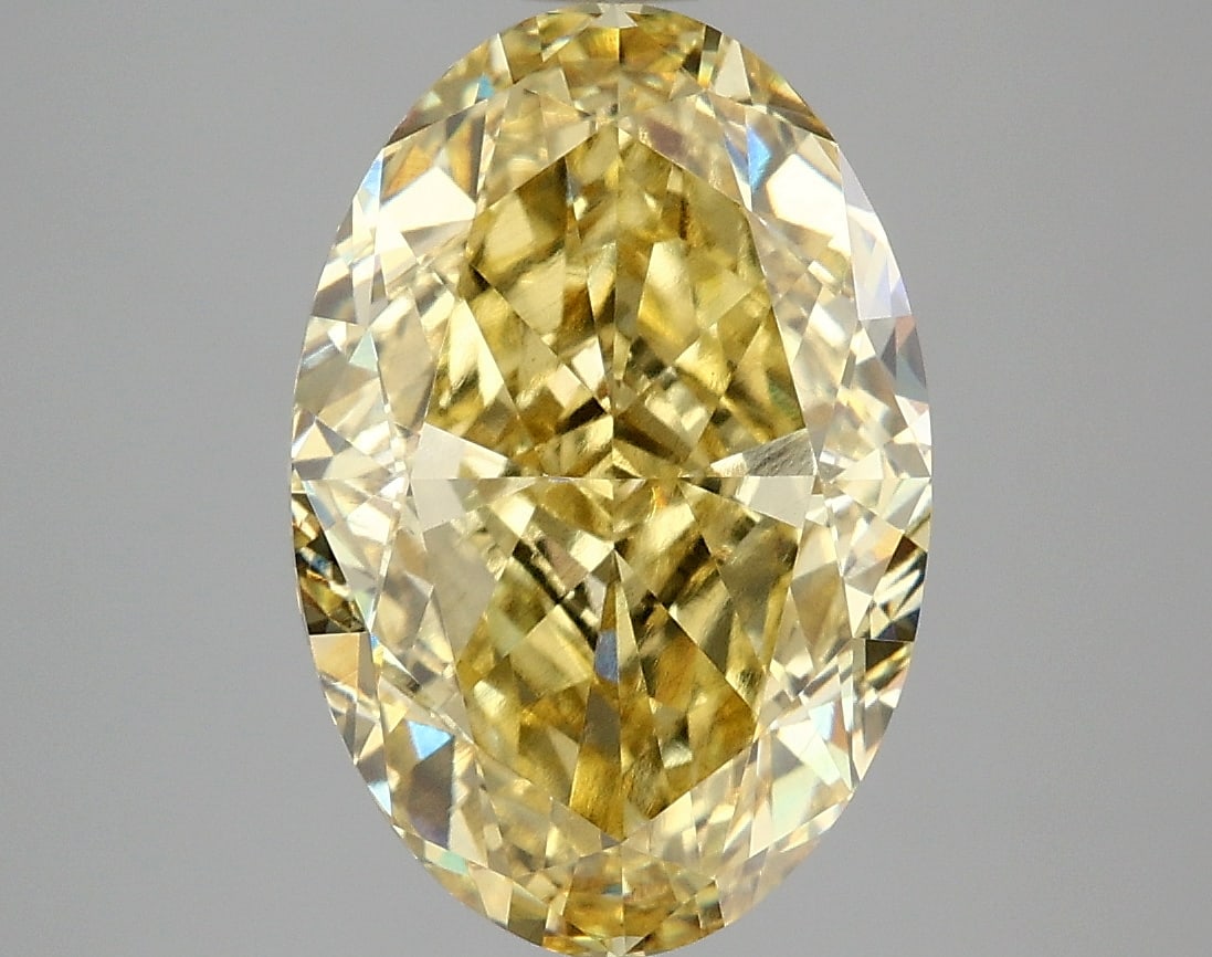 5.07 ctw. VS1 IGI Certified Oval Cut Loose Diamond (LAB GROWN): 5.07 ctw. VS1 IGI Certified Oval Cut Loose Diamond (LAB GROWN) -- IGI Certified Oval Cut Loose Diamond (LAB GROWN) - Weight :- 5.07 ctw; Color :- Fancy Vivid Yellow; Clarity :-VS1 #TSD70072v14