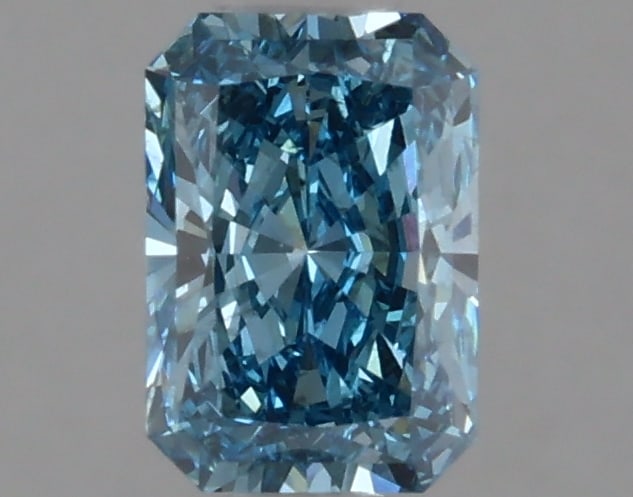 1.03 ctw. VS2 IGI Certified Radiant Cut Loose Diamond (LAB GROWN): 1.03 ctw. VS2 IGI Certified Radiant Cut Loose Diamond (LAB GROWN) -- IGI Certified Radiant Cut Loose Diamond (LAB GROWN) - Weight :- 1.03 ctw; Color :- Fancy Vivid Blue; Clarity :-VS2 #TSD72062v14