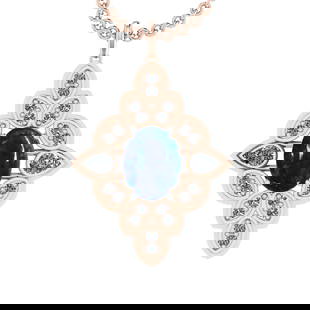 13.55 Ctw VS/SI1 Tanzanite and Diamond 14K Rose Gold Pendant: Center Stone Weight : 12.45 Ctw ( Oval Cab) Center Stone Color :-Tanzanite Setting : Prong Side Weight Of Ctw 3.10 Ctw Color : J-K Clarity :VS/SI1 Stone Setting : Prong Metal Weight : Approx 14.90