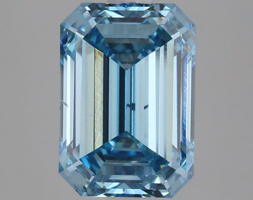 3.01 ctw. SI1 IGI Certified Emerald Cut Loose Diamond (LAB GROWN): IGI Certified Em Cut Loose Diamond (LAB GROWN) - Weight :- 3.01 ctw; Color :- Fancy Vivid Blue; Clarity :-SI1 #3SS24106v15