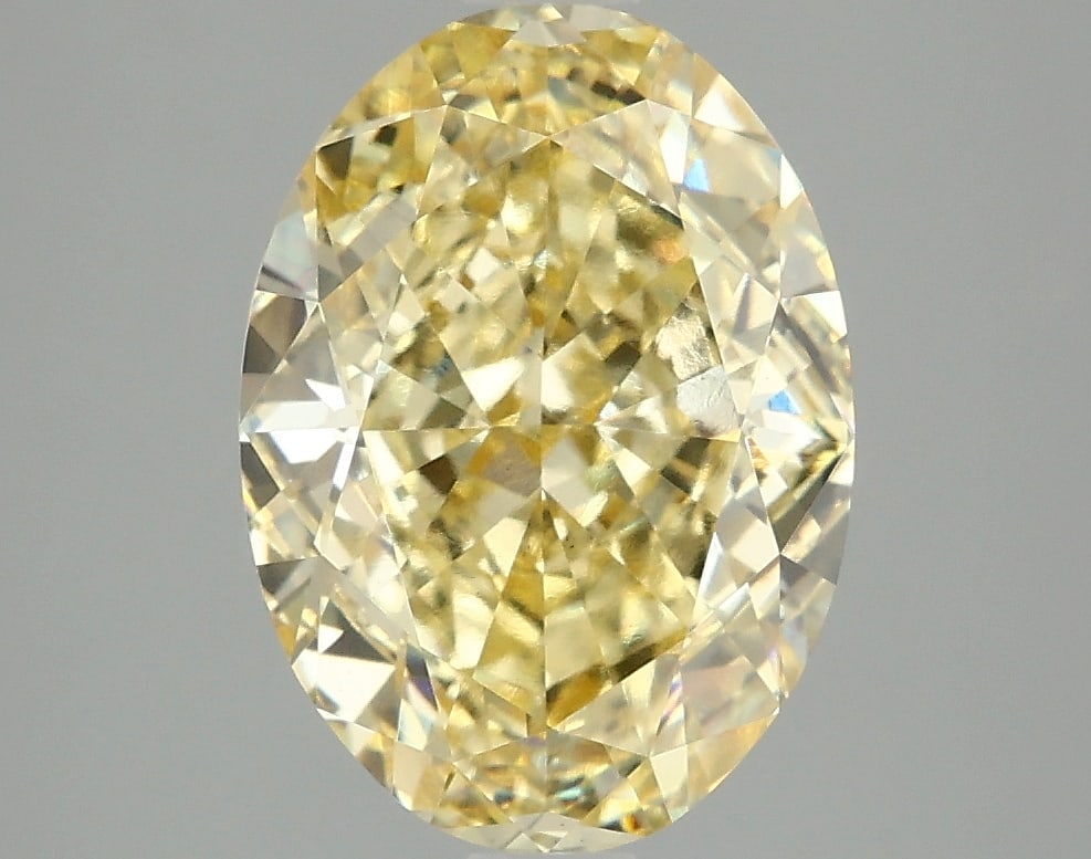 4.03 ctw. VS1 IGI Certified Oval Cut Loose Diamond (LAB GROWN): IGI Certified Ov Cut Loose Diamond (LAB GROWN) - Weight :- 4.03 ctw; Color :- Fancy Vivid Yellow; Clarity :-VS1 #3SS24158v15