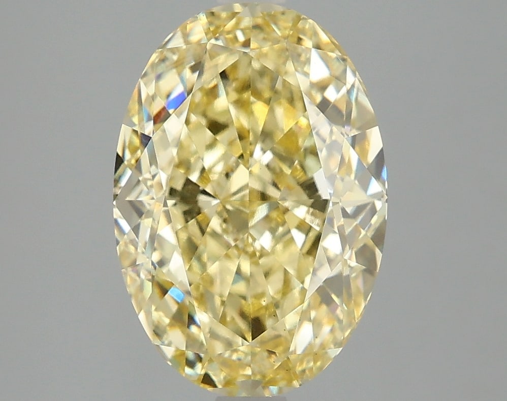 4.09 ctw. VS2 IGI Certified Oval Cut Loose Diamond (LAB GROWN): IGI Certified Ov Cut Loose Diamond (LAB GROWN) - Weight :- 4.09 ctw; Color :- Fancy Vivid Yellow; Clarity :-VS2 #3SS24196v15