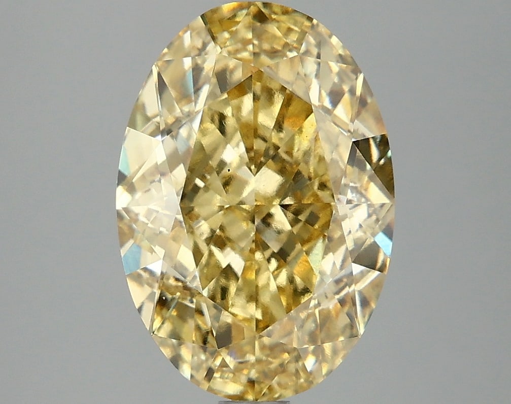 4.14ct Oval Cut Lab Grown Diamond: IGI CertifiedOvalCut Loose Diamond (LAB GROWN) - Weight:4.14 ctw; Color: Fancy Vivid Yellow; Clarity: VS1 #3SS98864v15