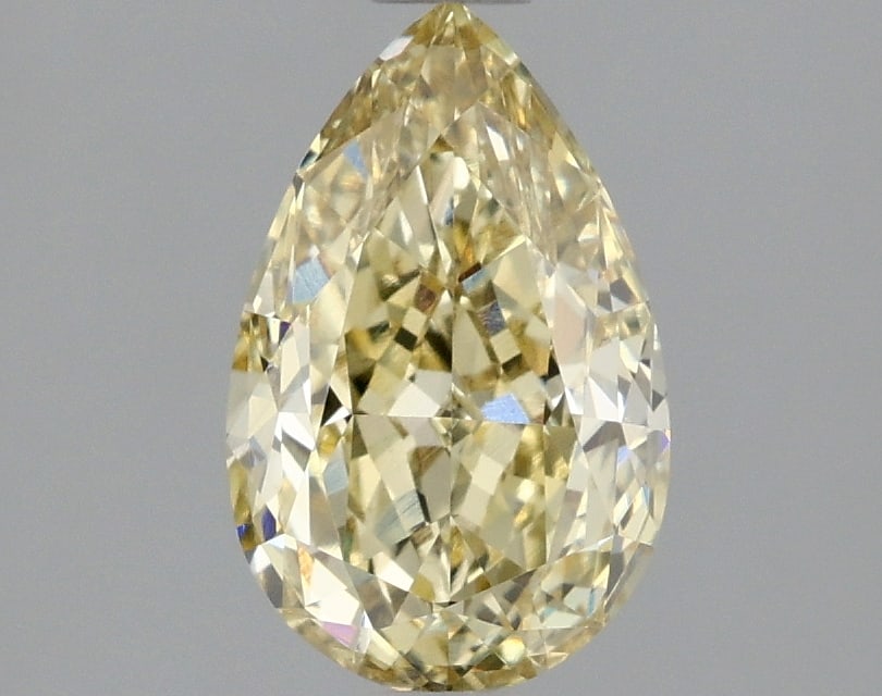 1.45 ctw. VS1 IGI Certified Pear Cut Loose Diamond (LAB GROWN): IGI Certified Pe Cut Loose Diamond (LAB GROWN) - Weight :- 1.45 ctw; Color :- Fancy Yellow; Clarity :-VS1 #3SS23848v15
