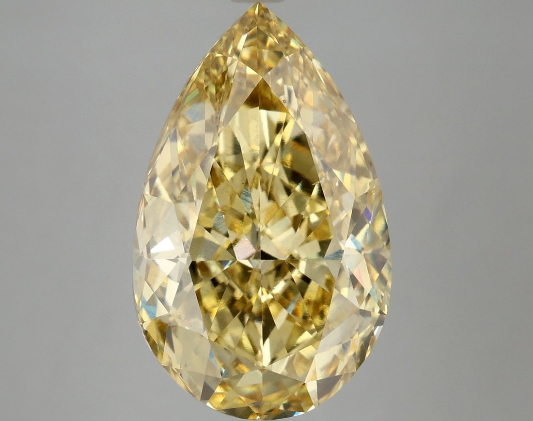 7.54 ctw. VS2 IGI Certified Pear Cut Loose Diamond (LAB GROWN): IGI Certified Pe Cut Loose Diamond (LAB GROWN) - Weight :- 7.54 ctw; Color :- Fancy Vivid Yellow; Clarity :-VS2 #3SS24271v15