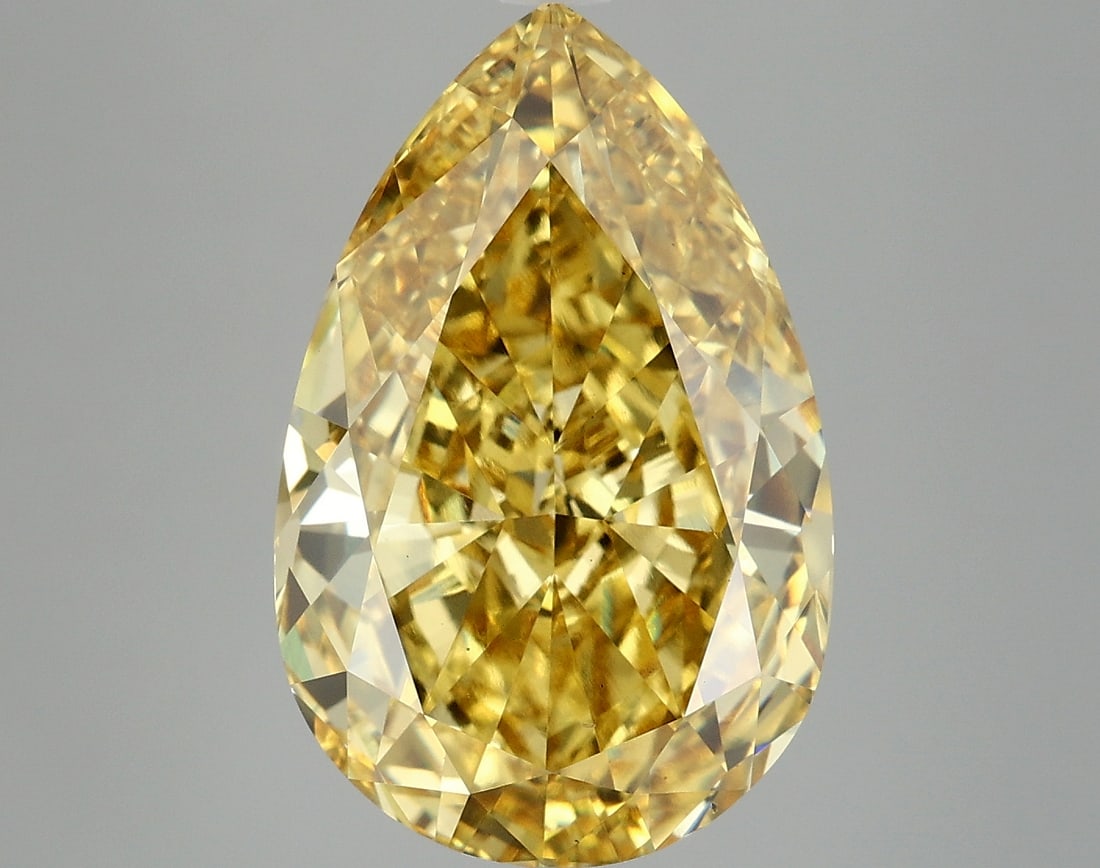 8.08 ctw. VS2 IGI Certified Pear Cut Loose Diamond (LAB GROWN): IGI Certified Pe Cut Loose Diamond (LAB GROWN) - Weight :- 8.08 ctw; Color :- Fancy Vivid Yellow; Clarity :-VS2 #3SS24273v15