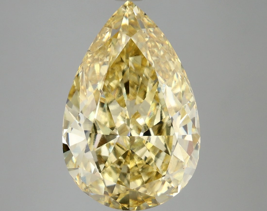 7.14 ctw. VS2 IGI Certified Pear Cut Loose Diamond (LAB GROWN): IGI Certified Pe Cut Loose Diamond (LAB GROWN) - Weight :- 7.14 ctw; Color :- Fancy Vivid Yellow; Clarity :-VS2 #3SS24266v15