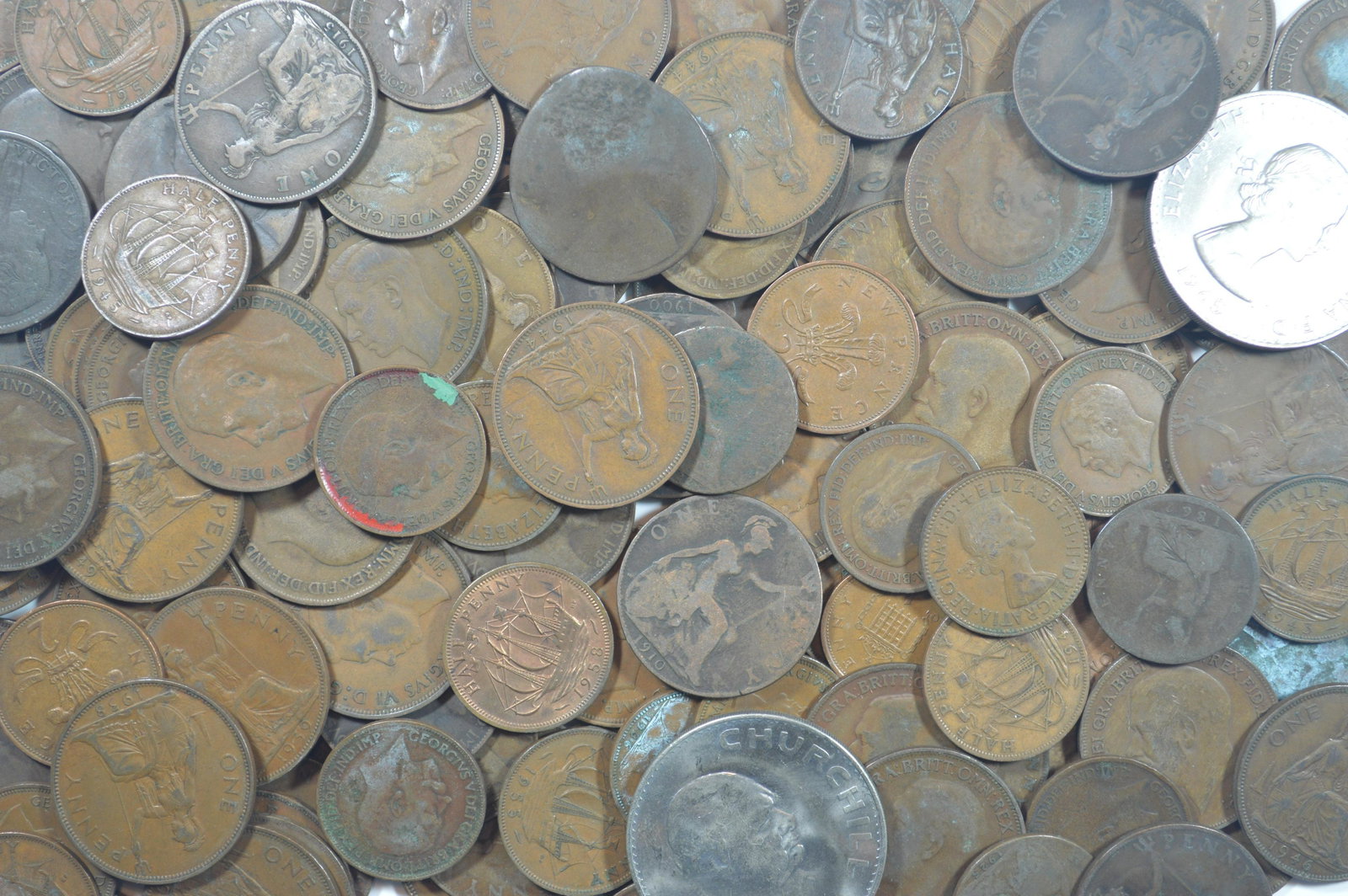 A Stash of British Coinage: A Stash of British Coinage predominantly made up of large pennies and halfpennies dating as far back as the 1860's. There are a small number of copper-nickel coins as well including a couple of Church