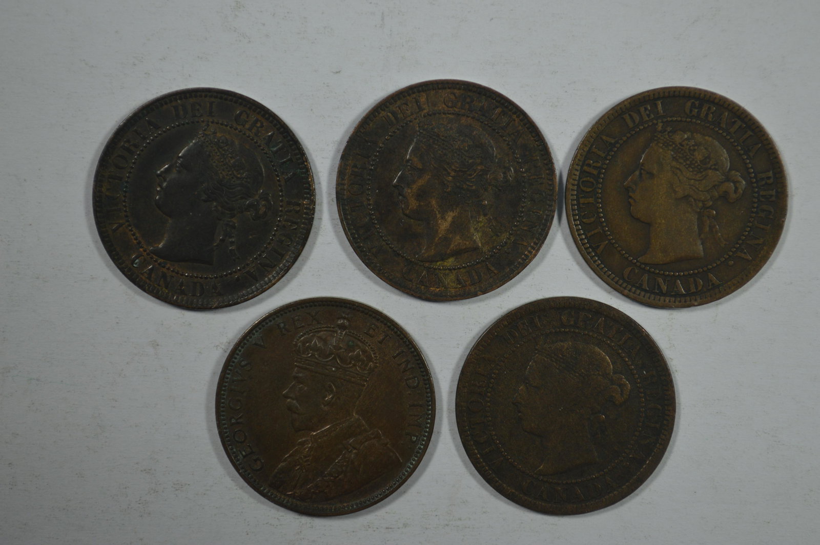 A Handful of Better Date and Better Grade Canadian Larg (1 of 2)