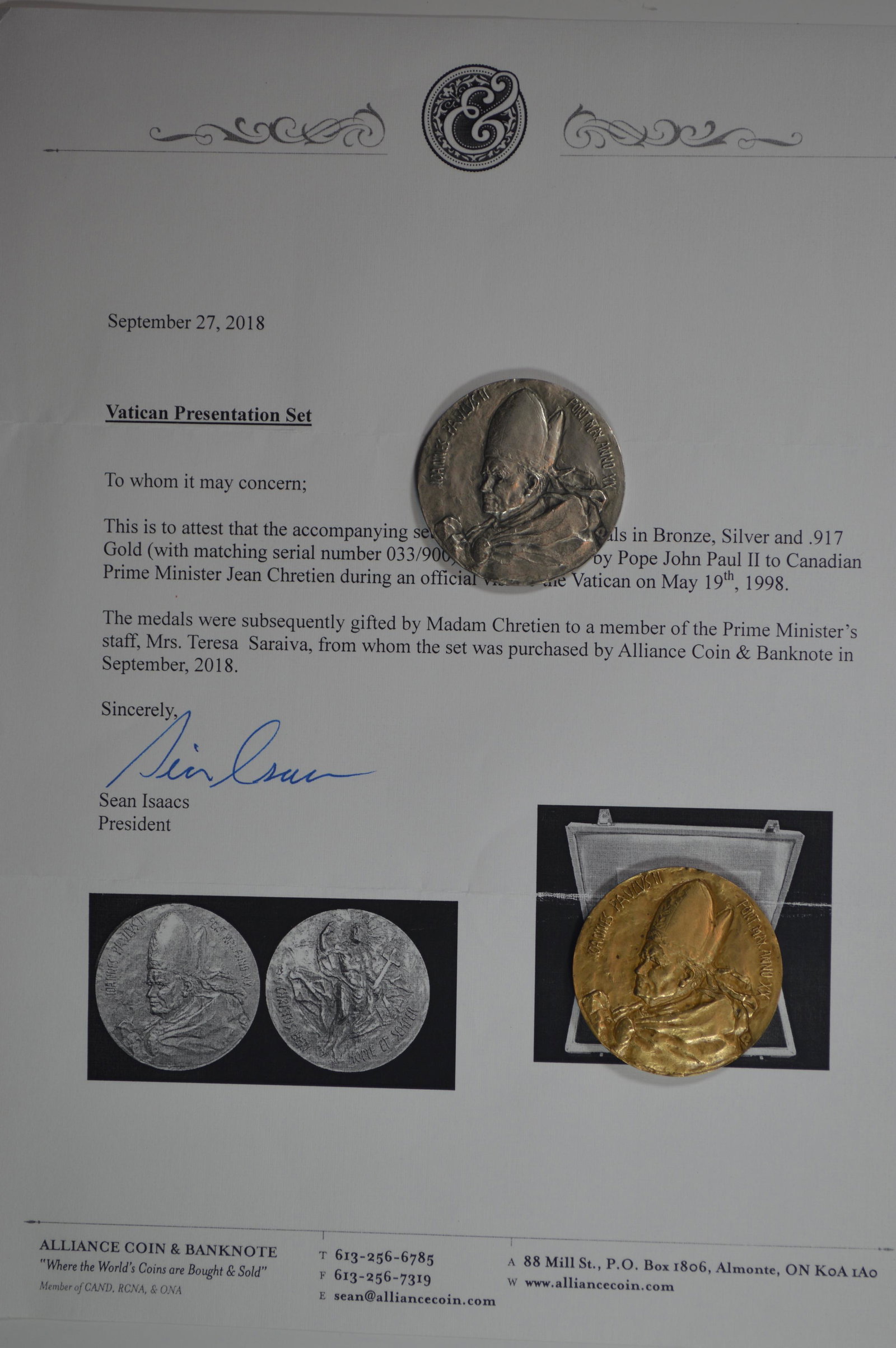 A 1997 Vatican Pope John Paul II Official Silver (.986: A 1997 Vatican Pope John Paul II Official Silver (.986 fine, 1.285 oz t.w.) and Bronze (1.205 oz) Medal Pairing. These medals are housed in their original box of issue with COA (the box of which once