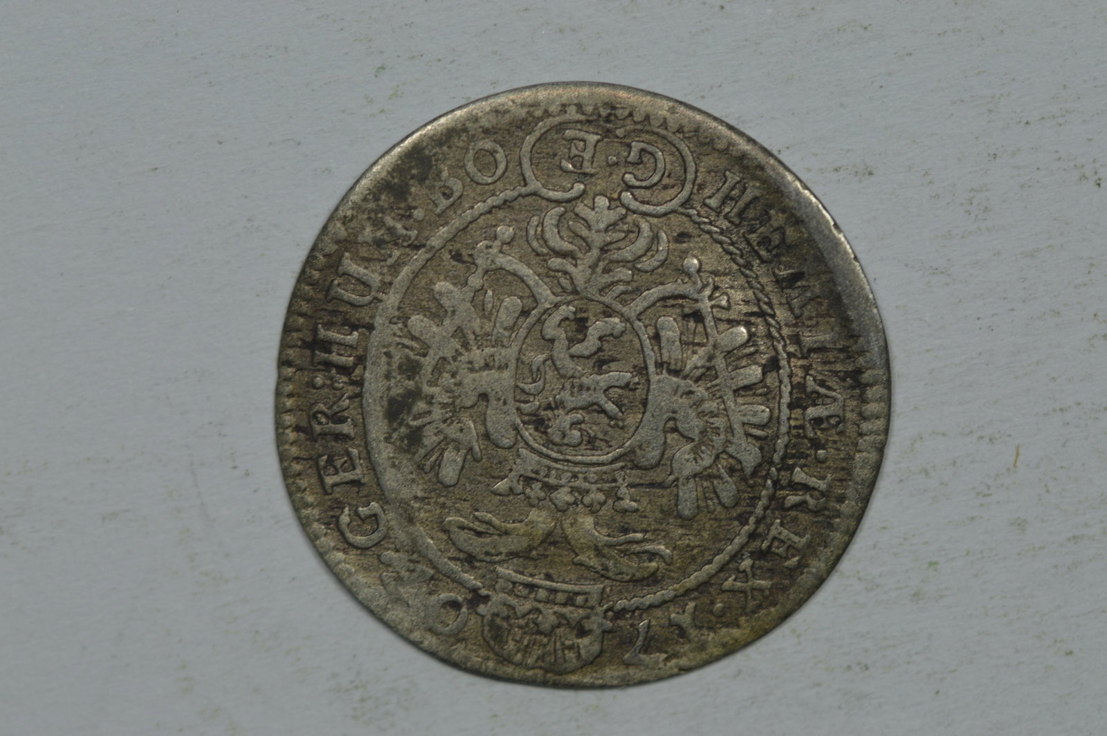 Bohemia 1707?-GE Silver 3 Kreuzer (KM-629). G/VG with n: Bohemia 1707?-GE Silver 3 Kreuzer (KM-629). G/VG with natural color and a wavy planchet. The last digit of the date is not entirely clear.