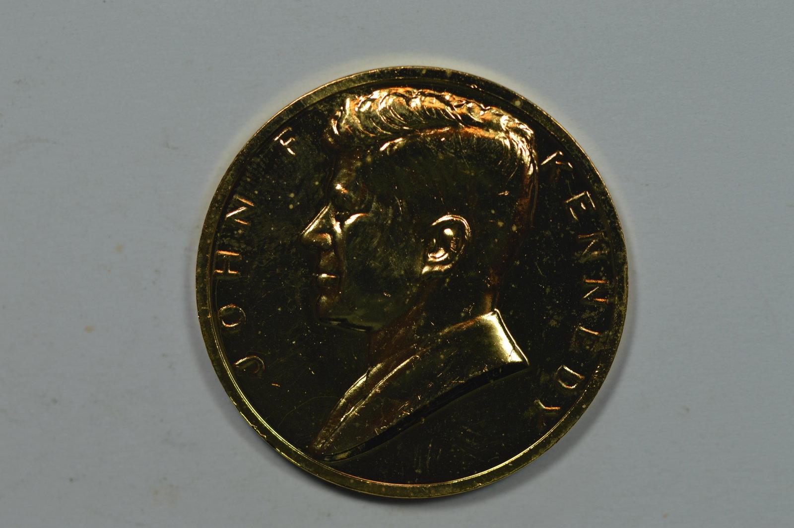 U.S. Mint Medal. Circa Mid-1970's (we think) John F. Ke: U.S. Mint Medal. Circa Mid-1970's (we think) John F. Kennedy Inaugural Medal design (gold-plated bronze, 1 5/16 inch diameter). Gem BU.