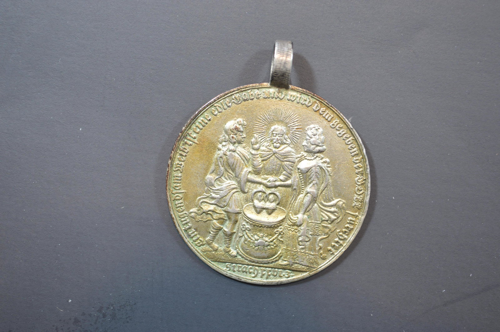 Intriguing Circa 1688-1739 German Marriage Medal by well known sculptor and medalist Christian: An Intriguing Circa 1688-1739 German Marriage Medal by well known sculptor and medalist Christian Wermuth. Cast Gilt Silver (44mm, 18.5 grams). VF/EF with a contemporary loop attached to the edge at 1