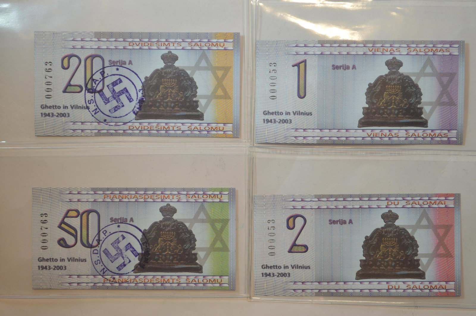 A Curious Lot of Mostly Lithuanian Souvenir Banknotes: A Curious Lot of Mostly Lithuanian Souvenir Banknotes, many of which bear very low serial numbers. Included are notes commemorating the Sixtieth Anniversary of the Ghetto in Vilnius, Pope John Paul II