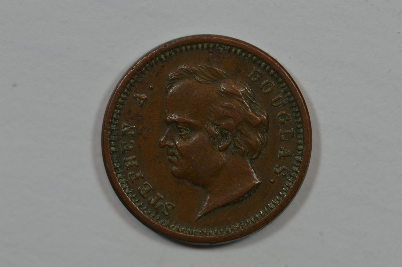 A Scarce Stephen A. Douglas Obverse Civil War Store Card of H. Upmeyer, Milwaukee (Copper, Fuld WI: A Scarce Stephen A. Douglas Obverse Civil War Store Card of H. Upmeyer, Milwaukee (Copper, Fuld WI 510AP-1a (R-3). EF with natural deposits in the devices. Est. $75.