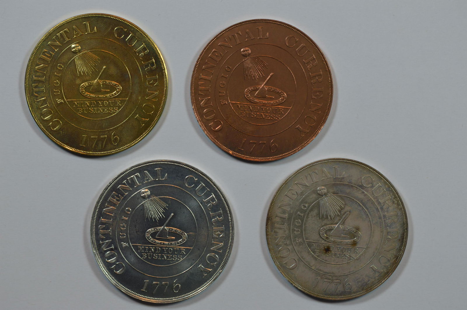 A So-Called Dollar Four-Piece Set of Circa 1962 Continental Dollar Bashlow Restrikes (1 of 2)