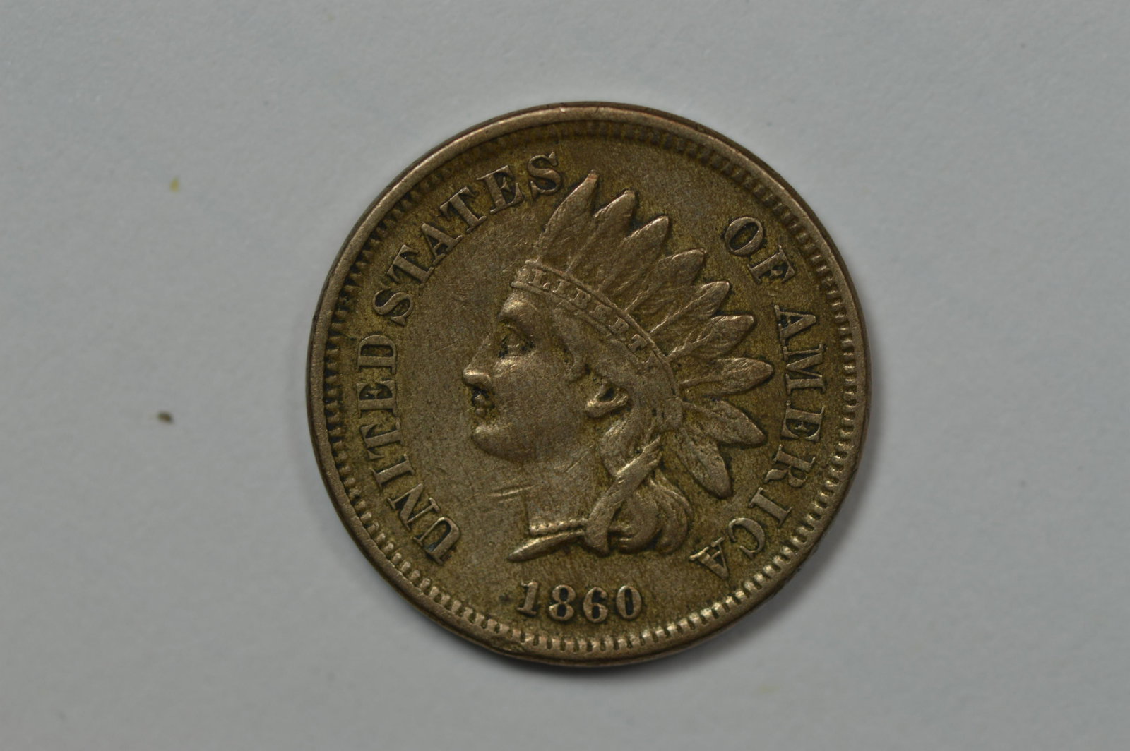 1c 1860 Pointed Bust.: 1c 1860 Pointed Bust. Ch VF and enjoying plenty of definition for the assigned grade. The color likewise, is wholly natural. This pointed bust variety is significantly scarcer than its rounded bust co