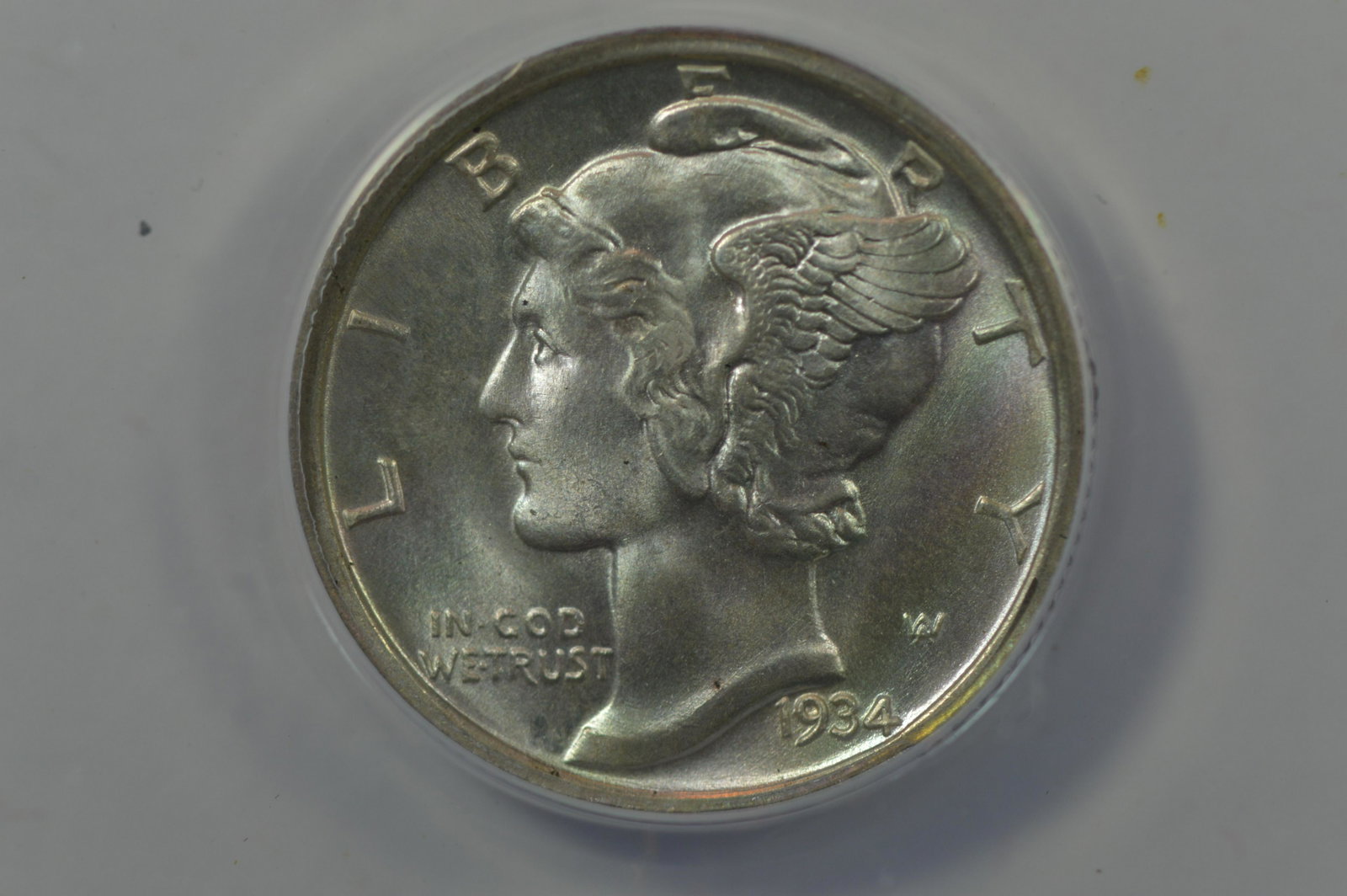 10c 1934-D ANACS MS65: 10c 1934-D ANACS MS65 and markedly undergraded in our opinion. The lustre is too rich, and the surfaces clearly too smooth to only be deserving of an MS65 grading. We suggest that you take a close loo