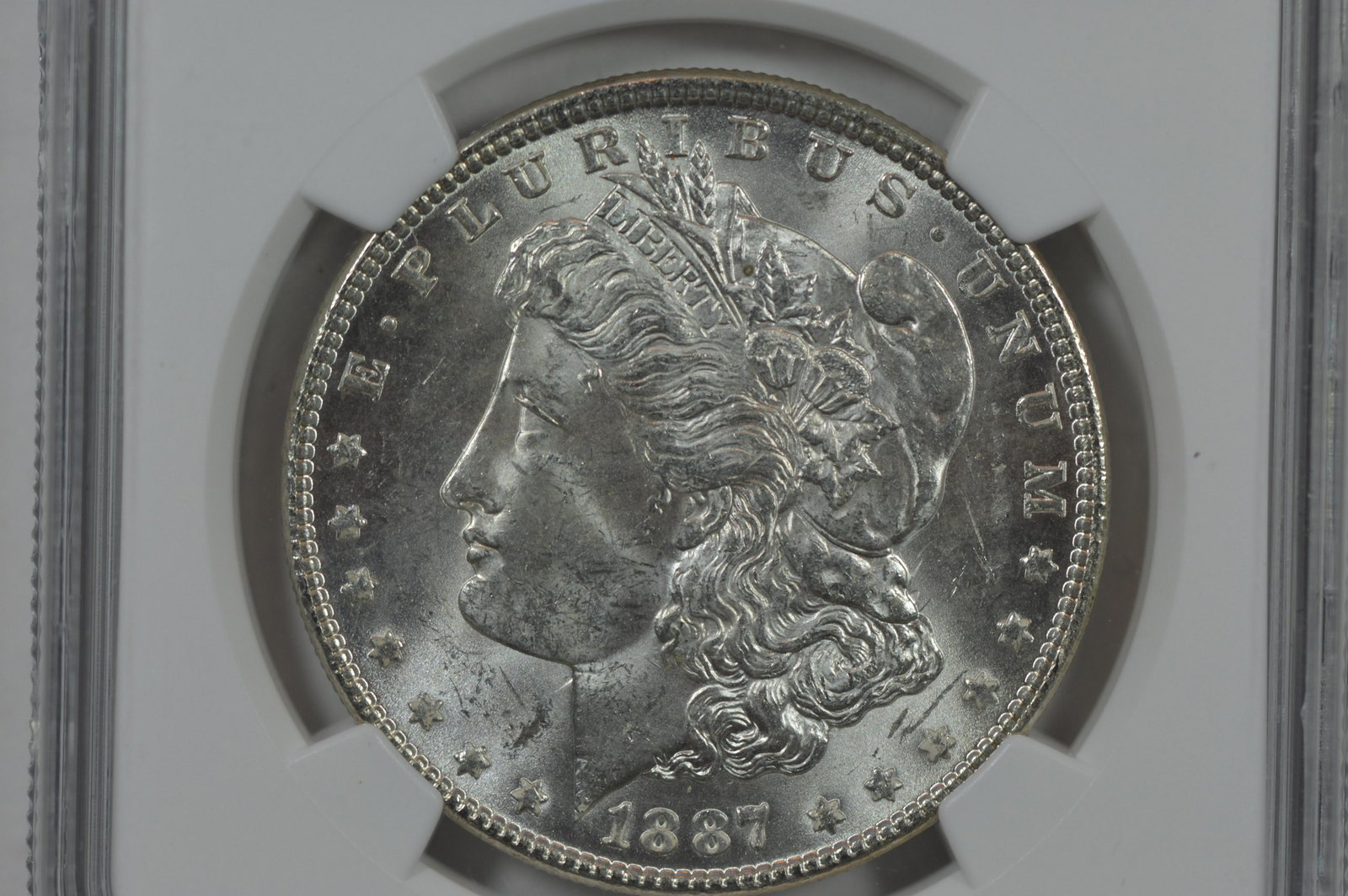 $1.00 Silver 1887 VAM-12A "Alligator Eye & Clashed Dies". NGC MS63. (1 of 2)