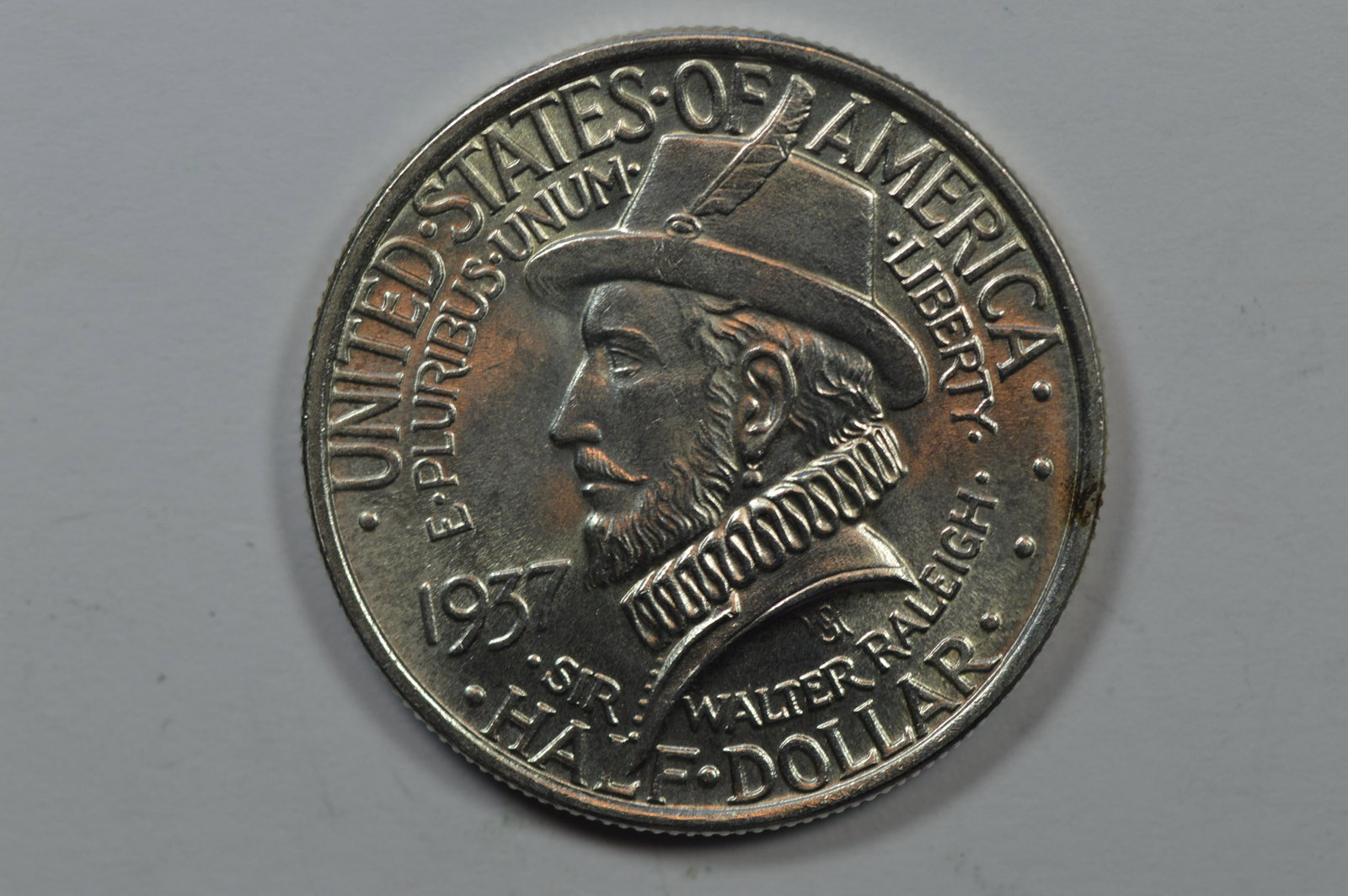 50c Commemorative.: 50c Commemorative. 1937 Roanoke. An icy-white Very Choice BU specimen at a glance, however the surfaces have been "brightened" to enhance the appearance. Est. $120.