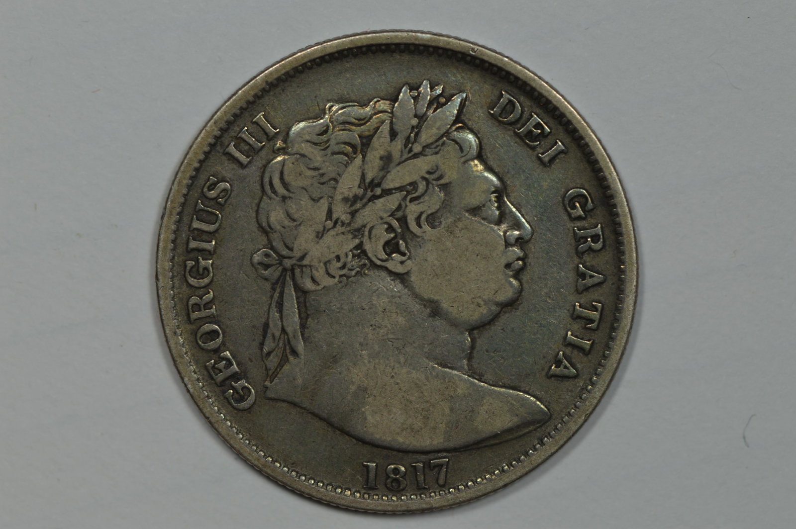 Great Britain 1817 Silver Halfcrown (KM-667, .4204 oz ASW).: Great Britain 1817 Silver Halfcrown (KM-667, .4204 oz ASW). A handsome F/VF with balanced coloration and smooth surface quality. $90.