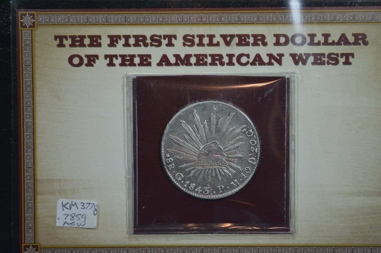 A Pair of Earlier Mexican Crown-Sized Coins in Promotional Holders (1 of 2)