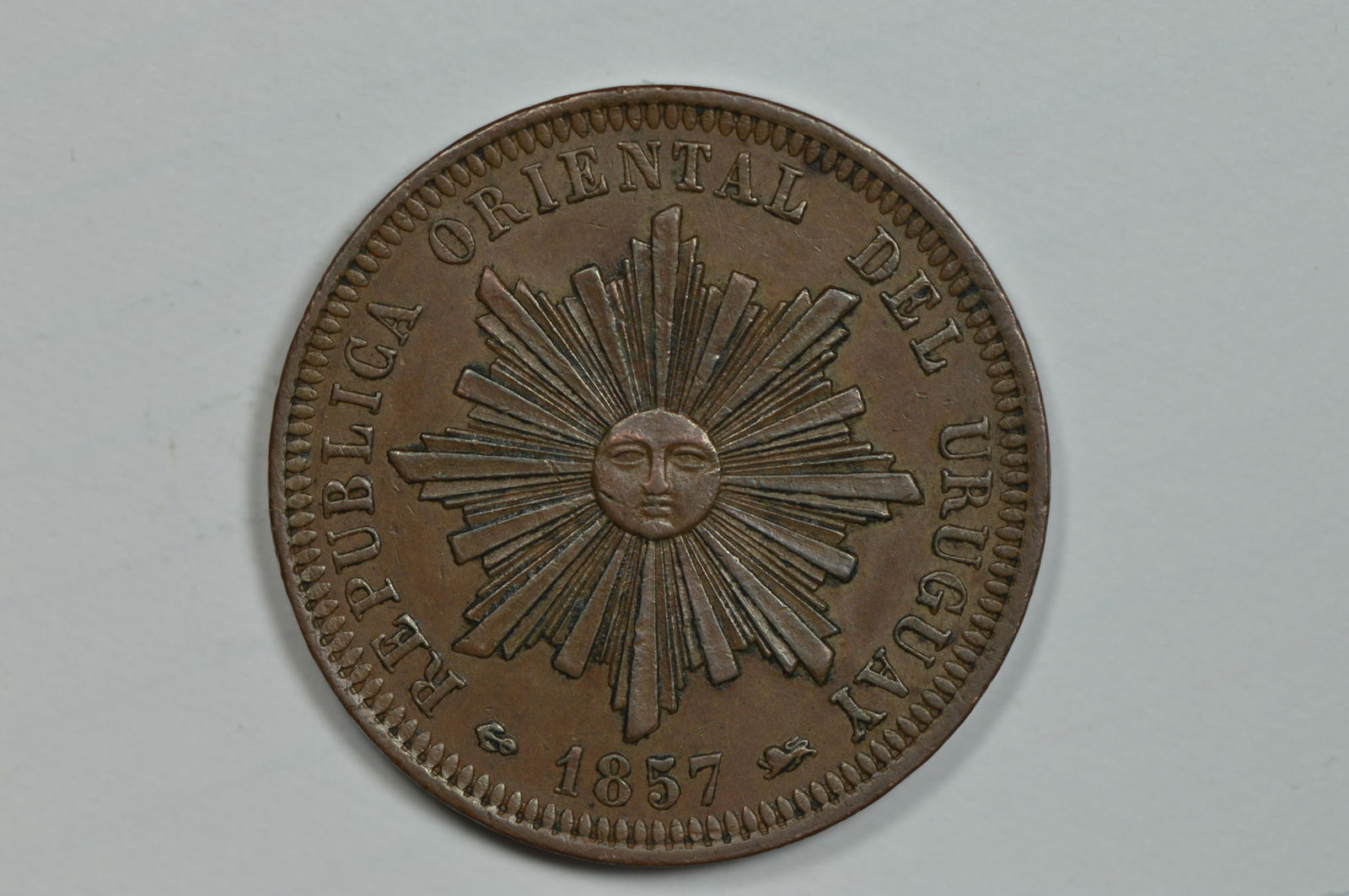 Uruguay 1857-D 40 Centesimos (KM-10). (1 of 2)