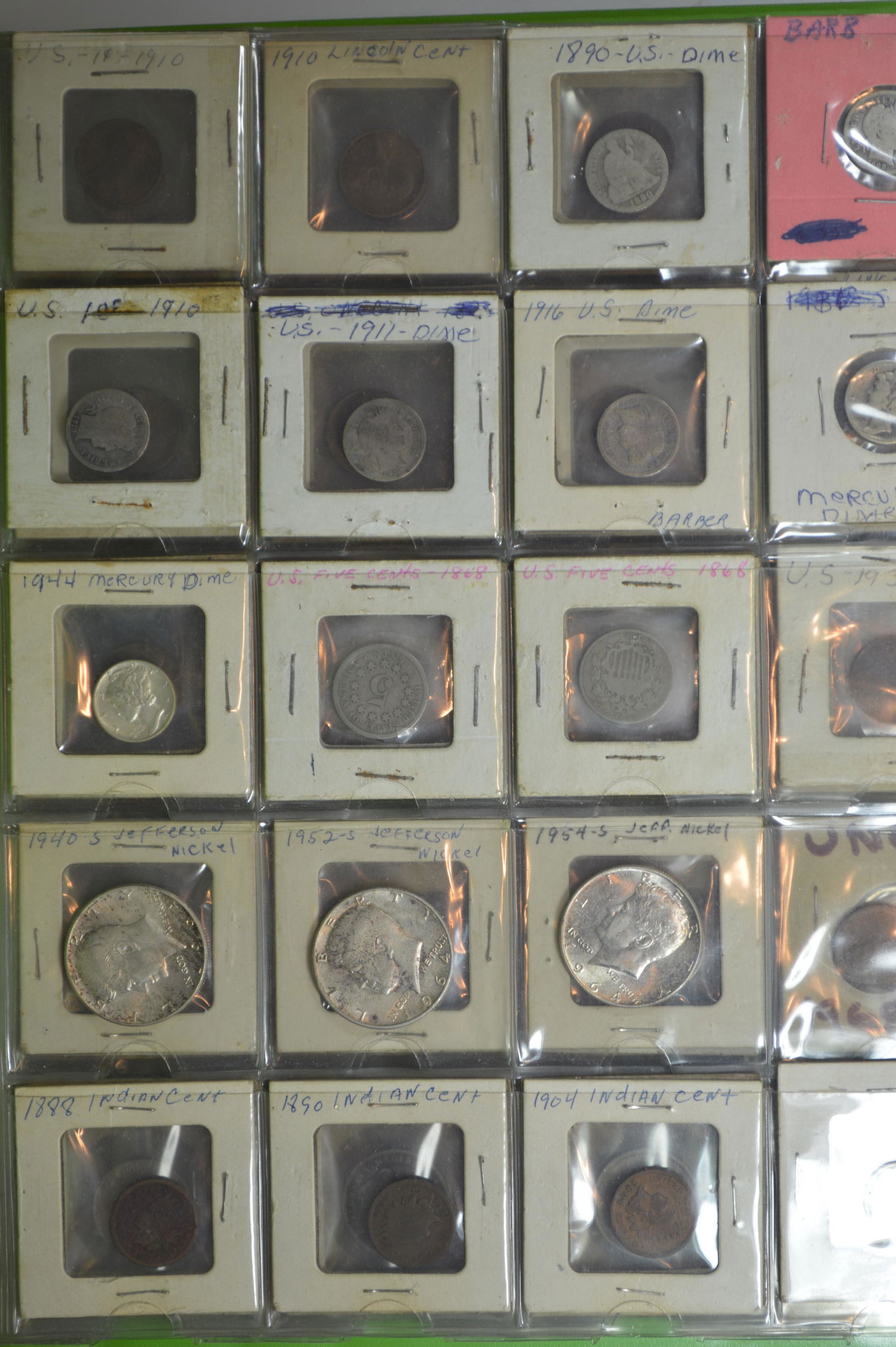Mostly North American Coins and Tokens mounted in a three-ring binder (1 of 2)