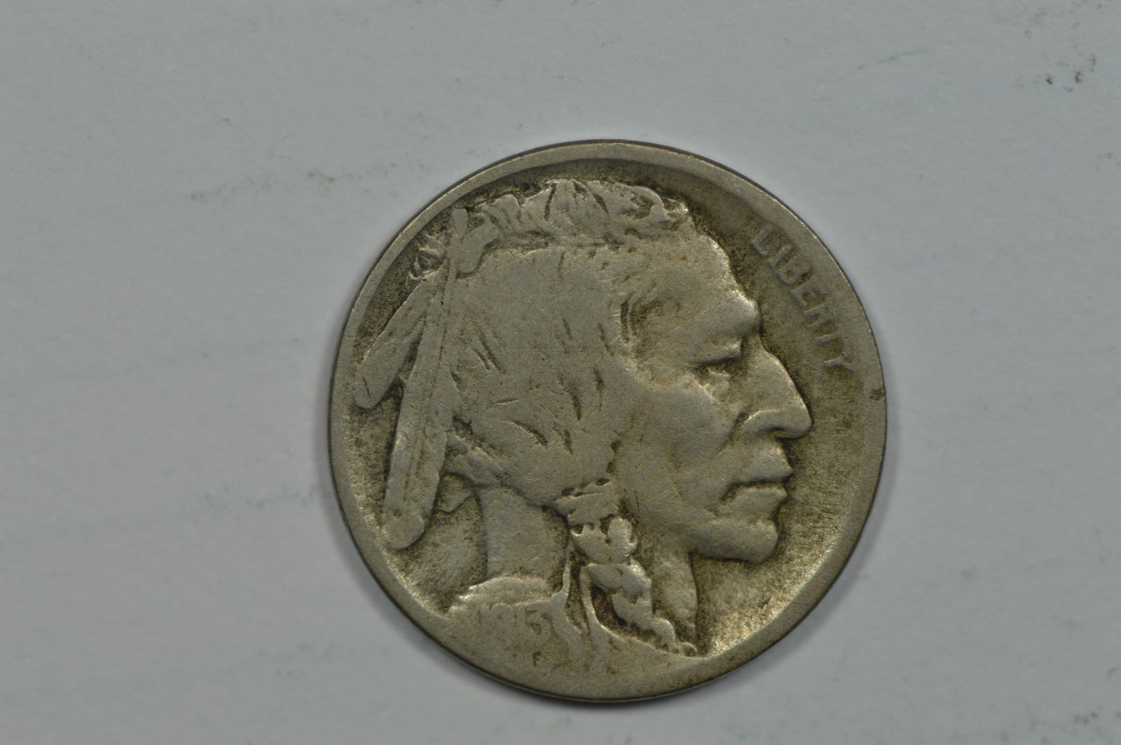 5c 1913-D Type II: 5c 1913-D Type II. A solid VG with some elements of the design approaching Fine. Smooth, even wear characterizes this scarce coin, and though the date could be a bit sharper, the horn of the Buffalo i