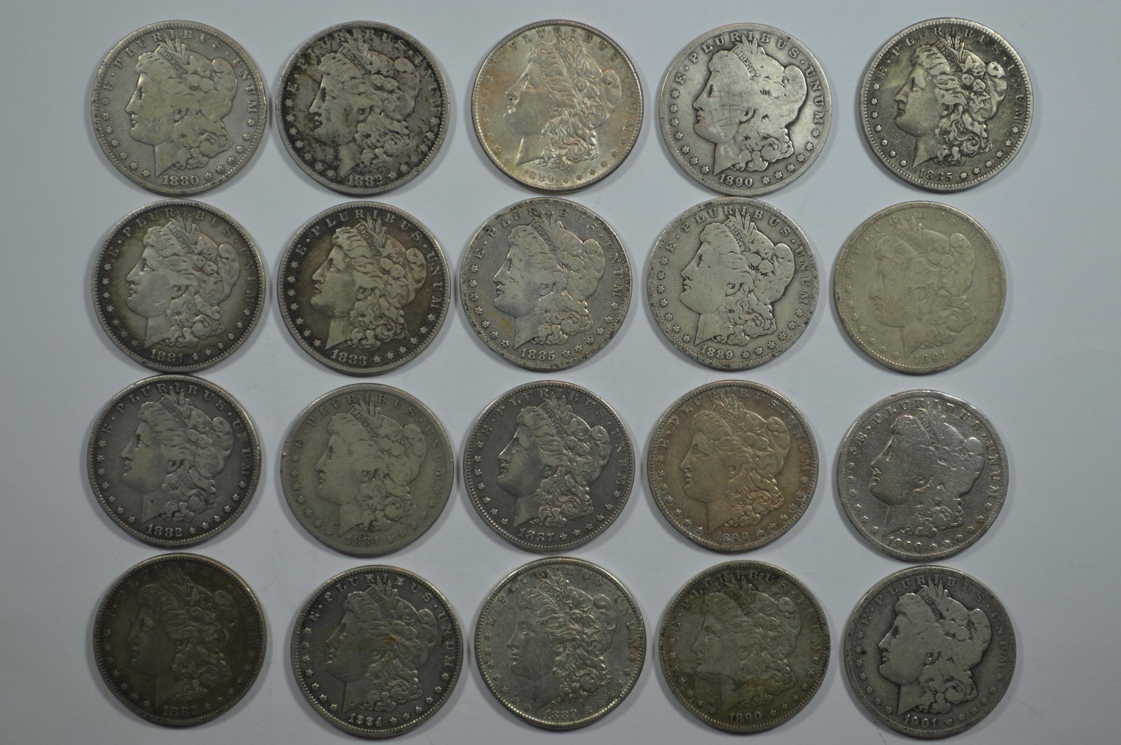 A Roll of Circulated Morgan Dollars (1880-1901) with only a handful of duplicate dates. (1 of 2)