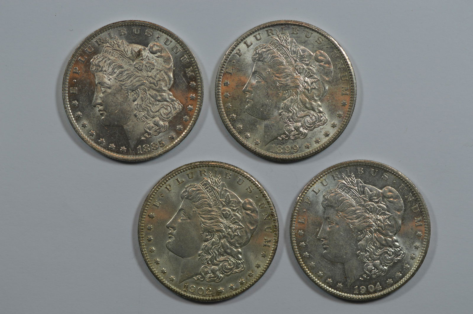 A Quartet of Near Mint State New Orleans Mint Morgan Dollars (1 of 2)