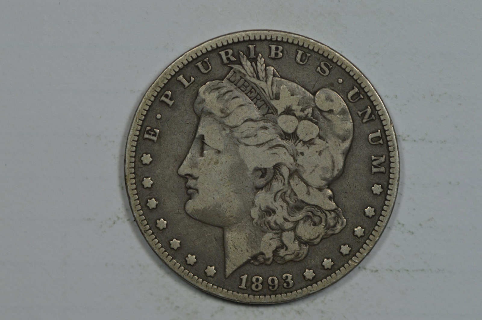 $1.00 Silver 1893 About Fine.: $1.00 Silver 1893 About Fine. Wholesome, smooth and quite scarce. Est. $170.