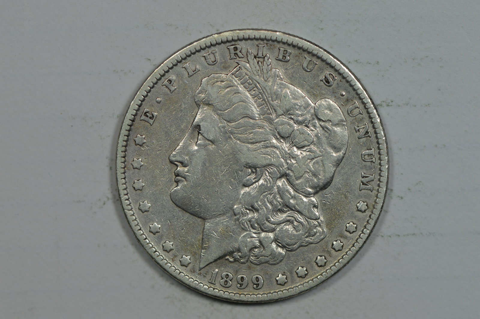 $1.00 Silver 1899 Nearly VF (1 of 2)