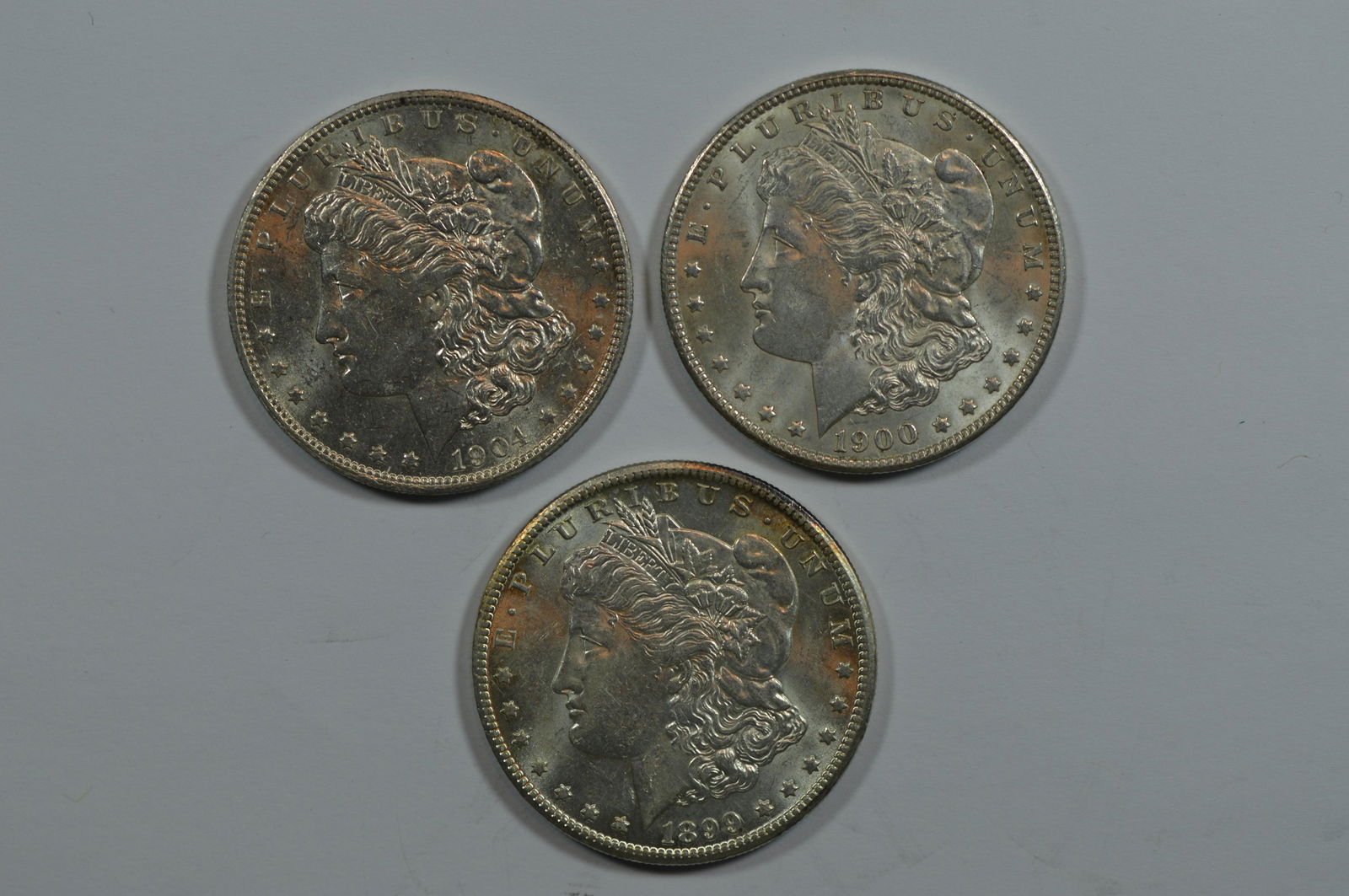 A Threesome of Virtual Mint State New Orleans Mint Morgan Dollars (1 of 2)
