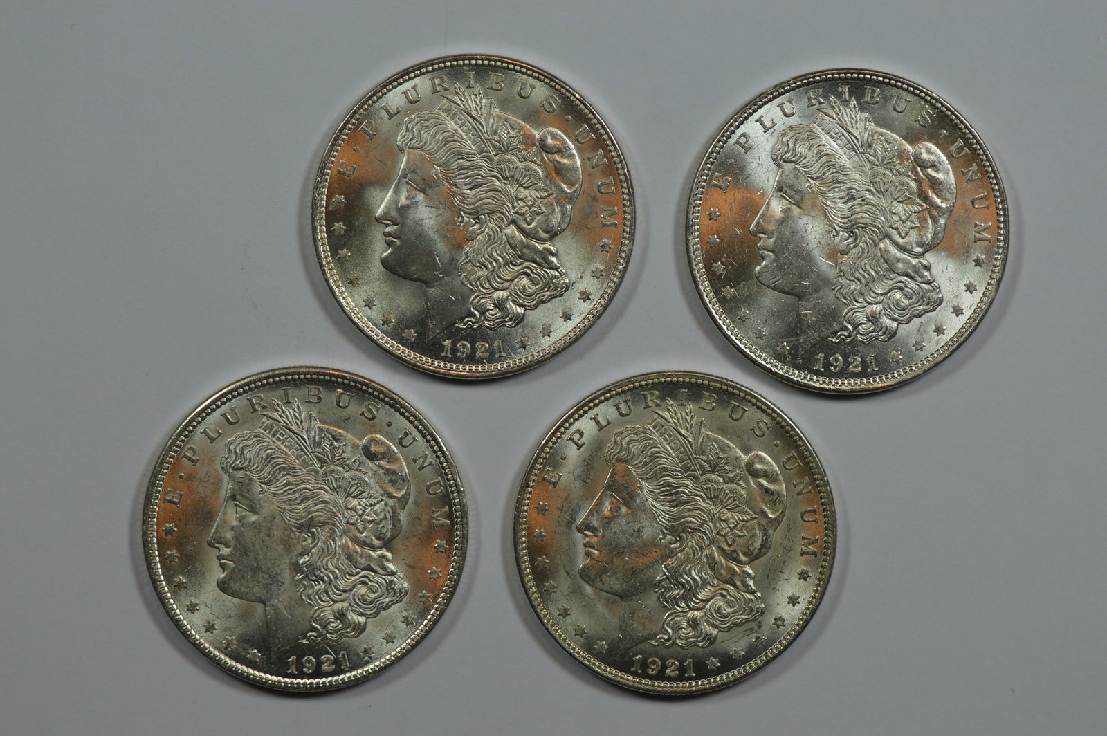 A Foursome of Mint State and Better 1921 Morgan Dollars. (1 of 2)