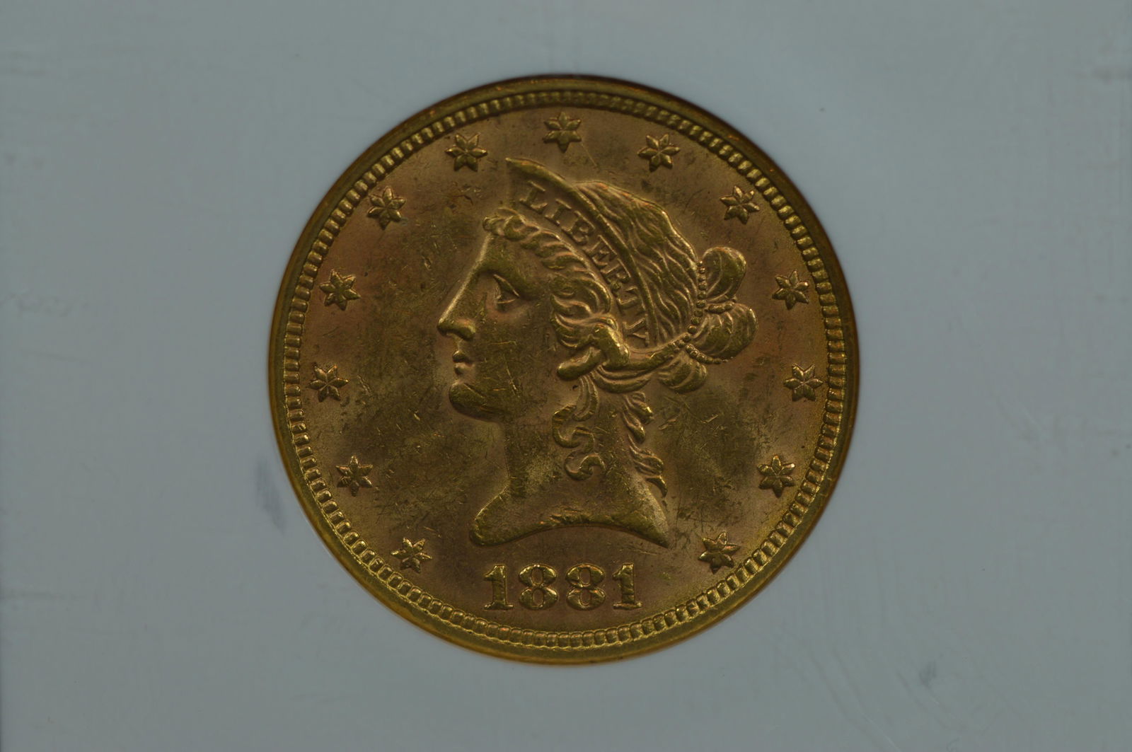 $10.00 Gold 1881 NGC MS62. (1 of 2)