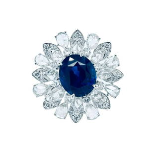 Blue Sapphire And Rose Cut Diamond Ring: Metal: 18KW Weight: 7.75 Grams Stone: Blue Sapphire, Diamond Carat: 4.54ctw Sapphire, 2.27ctw Diamond Description: Deep transparent crystal blue GRS Lab certified sapphire with rose cut and