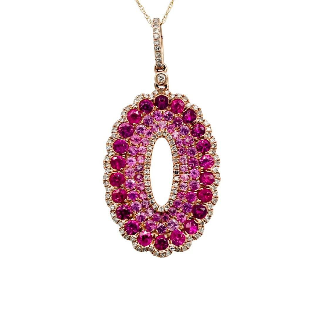 Pink Sapphire Fade-Shade Pendant: Metal: 14K Weight: 4.5 Grams Stone: Pink Sapphire, Diamond Carat: 2.64ctw Sapphire, 0.35ctw Diamond Description: esate fade to shade pink sapphire pendant that measures 1.5 inches from bail to bottom 