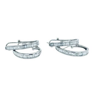 Estate Diamond Earring Lot (2): Metal: 14KW Weight: 9.3 Grams Stone: Diamond Carat: 2.00ctw Description: Estate lot of 2 diamond baugett half huggie hoop earrings with post omega clip backs. each pair or 1.00ctw diamonds