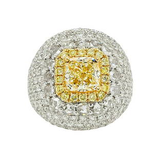 Estate Yellow Diamond Solitaire Ring: Metal: 18KW Weight: 10.6 Grams Stone: Yellow Diamond, White Diamond Carat: 2.11ctw Diamond Center, 4.45ctw Diamond Accents Description: Esatate 2.11ctw cushion cut yellow diamond center stone