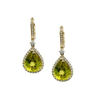 Sphene And Diamond Earrings: Metal: 14KY Weight: 4.02 Grams Stone: Sphene, Diamond Carat: 10.33ctw Sphene, 0.67ctw Diamond Description: Estate Color shift green sphene drop earrings with french clip backs. earrings