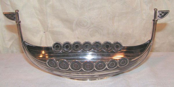 norwegian sterling silver viking ship bowl mark of: norwegian sterling silver viking ship bowl mark of j tostrup oslo 9 1/4 inches long excellent condition 4.5 troy ounces