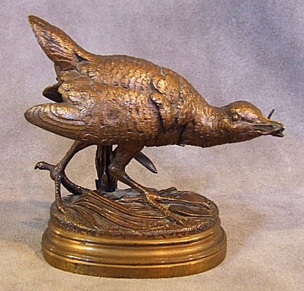 A. Dubucand bronze figurine of grouse with worm in : A. Dubucand bronze figurine of grouse with worm in beak. Measures 3.75" H. X 4"L.