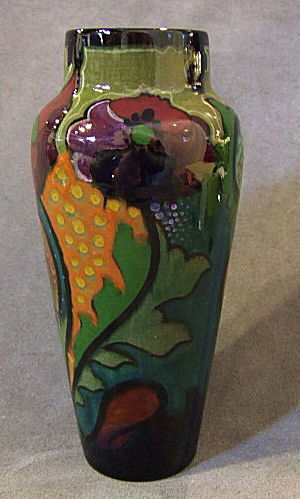 Gouda Pottery high glaze Tulip & Rose vase, minor c: Gouda Pottery high glaze Tulip & Rose vase, minor crazing, very shallow flake on base and one glaze miss on bottom edge. 5.5"H.